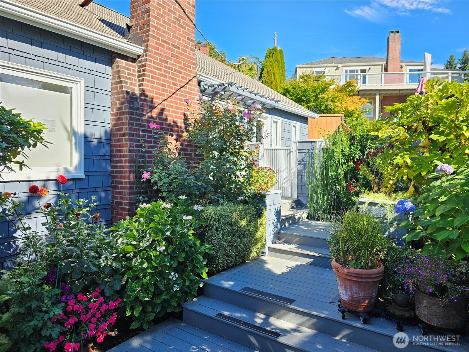 2822 Prosch Avenue West Seattle, WA 98119 - Photo 3 of 31 a wooden bench sitting in front of a house