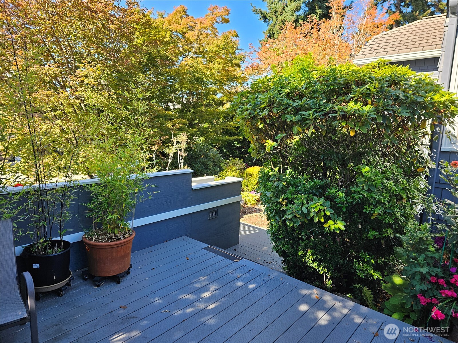 2822 Prosch Avenue West Seattle, WA 98119 - Photo 4 of 31 a table and chairs in front of yellow house