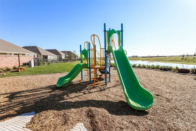 a view of a park with swings