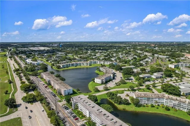a view of a lake with a city