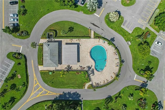 an aerial view of a swimming pool