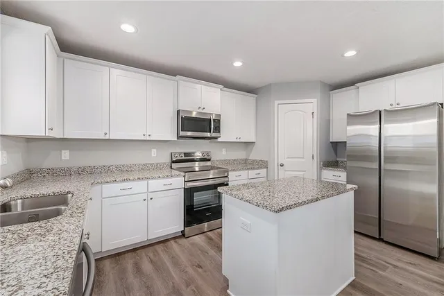 $415,000 | 705 Poplar Circle, Belton, MO 64012