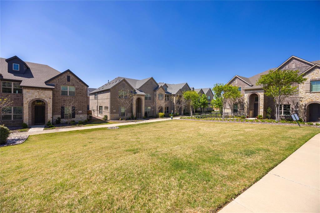 631 Cobblestone Lane Irving, TX 75039 - Photo 27 of 32 a view of a house with a swimming pool