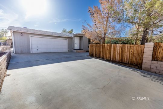 1015 South Mahan Street Ridgecrest, CA 93555 - Photo 3 of 31 a view of a backyard of the house