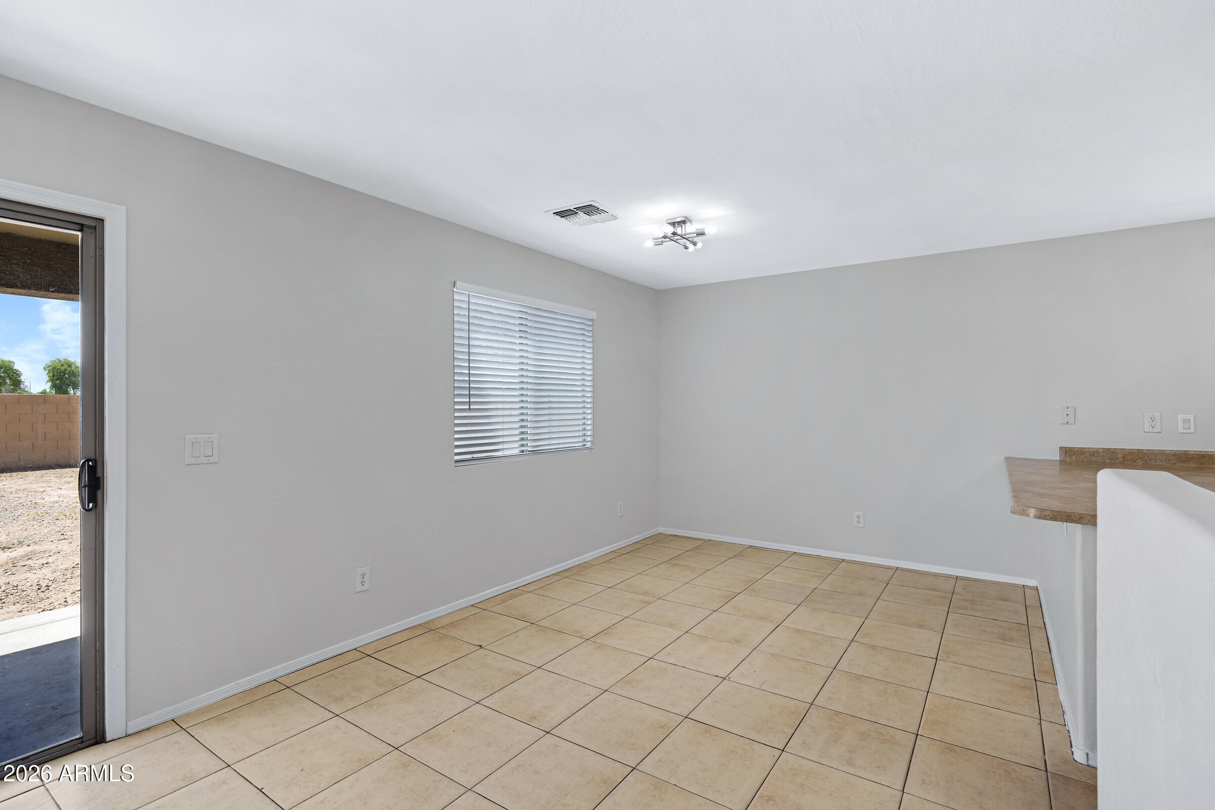 19408 North Braden Road Maricopa, AZ 85138 - Photo 13 of 51 a view of an empty room