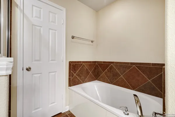 a bathroom with a bathtub