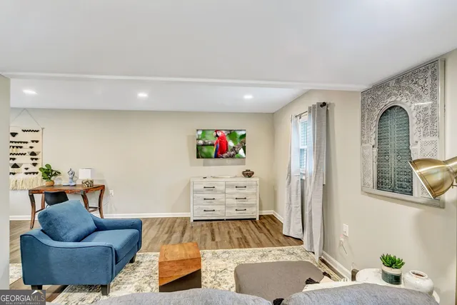 a living room with furniture and a couch