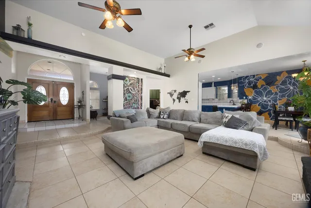 a bedroom with furniture and a chandelier
