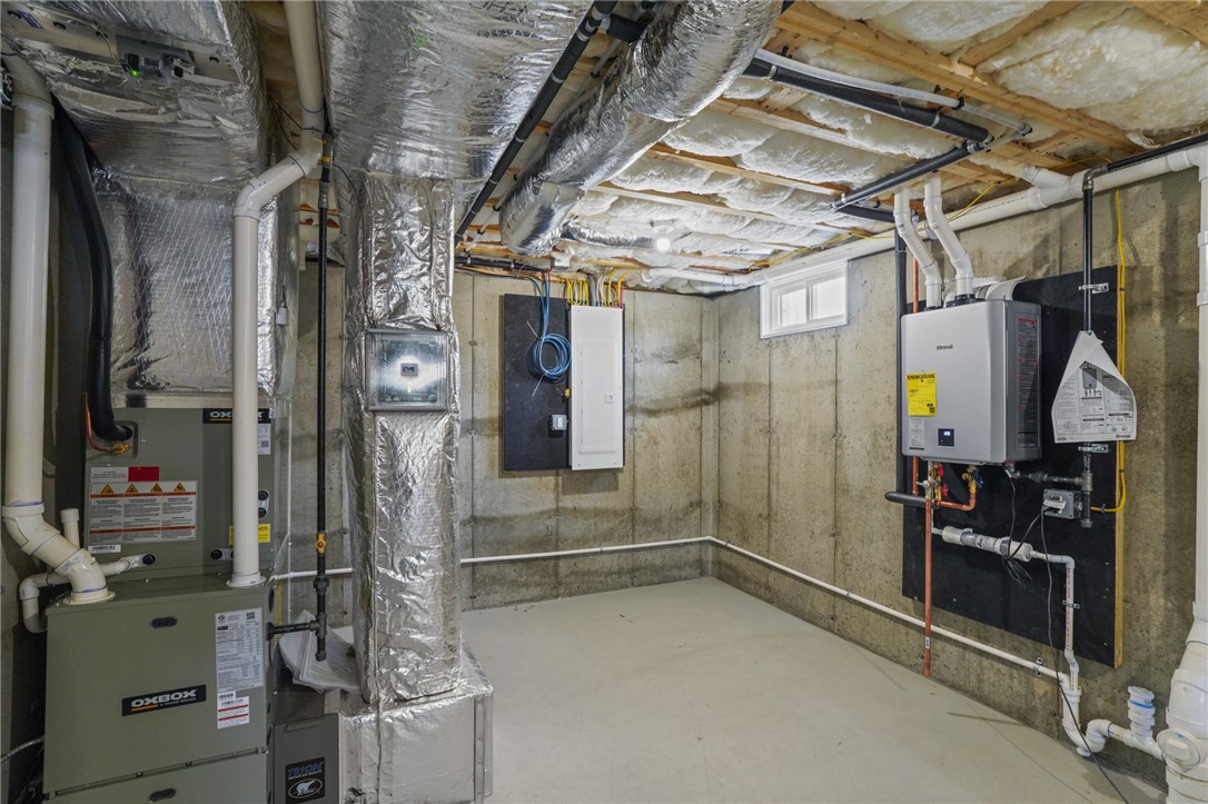 5 Red Maple Lane Warwick, RI 02886 - Photo 27 of 35 Tankless hot water heater, high-efficiency heating & cooling system, and 200 amp panel