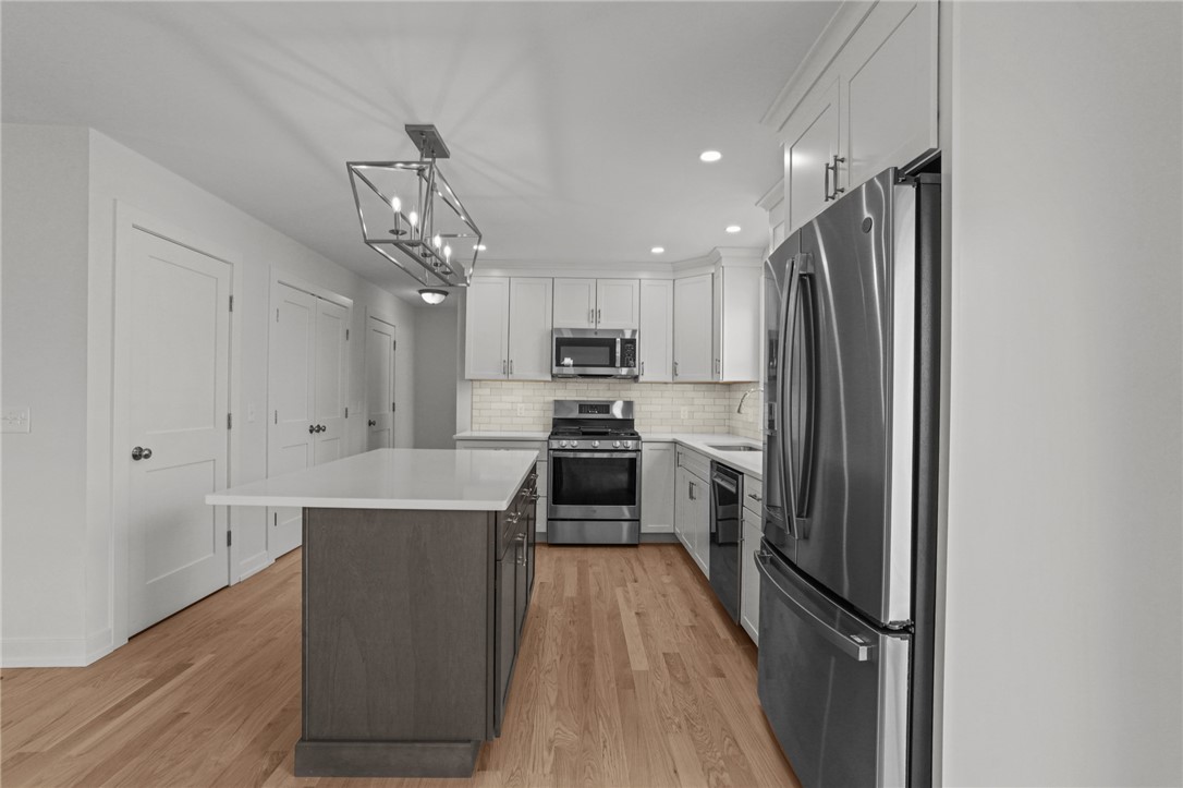 5 Red Maple Lane Warwick, RI 02886 - Photo 5 of 35 Beautiful kitchen with soft-close cabinets and drawers and stainless appliances