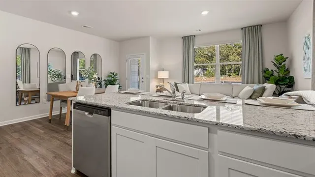 a kitchen with sink and window