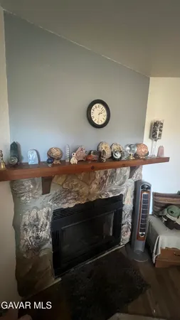 a stove top oven sitting inside of a kitchen