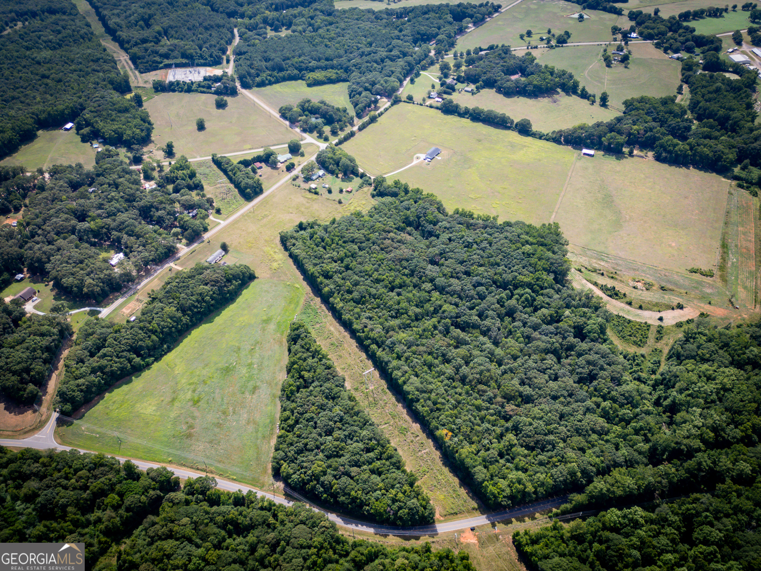 0 New Haven Church Road Danielsville, GA 30633 - Photo 2 of 9 an aerial view of residential houses with outdoor space