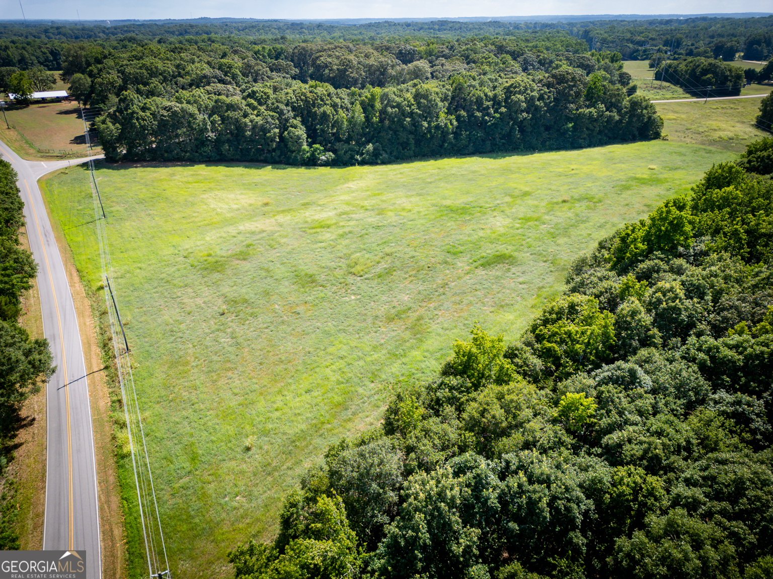 0 New Haven Church Road Danielsville, GA 30633 - Photo 8 of 9 a view of an outdoor space and a yard