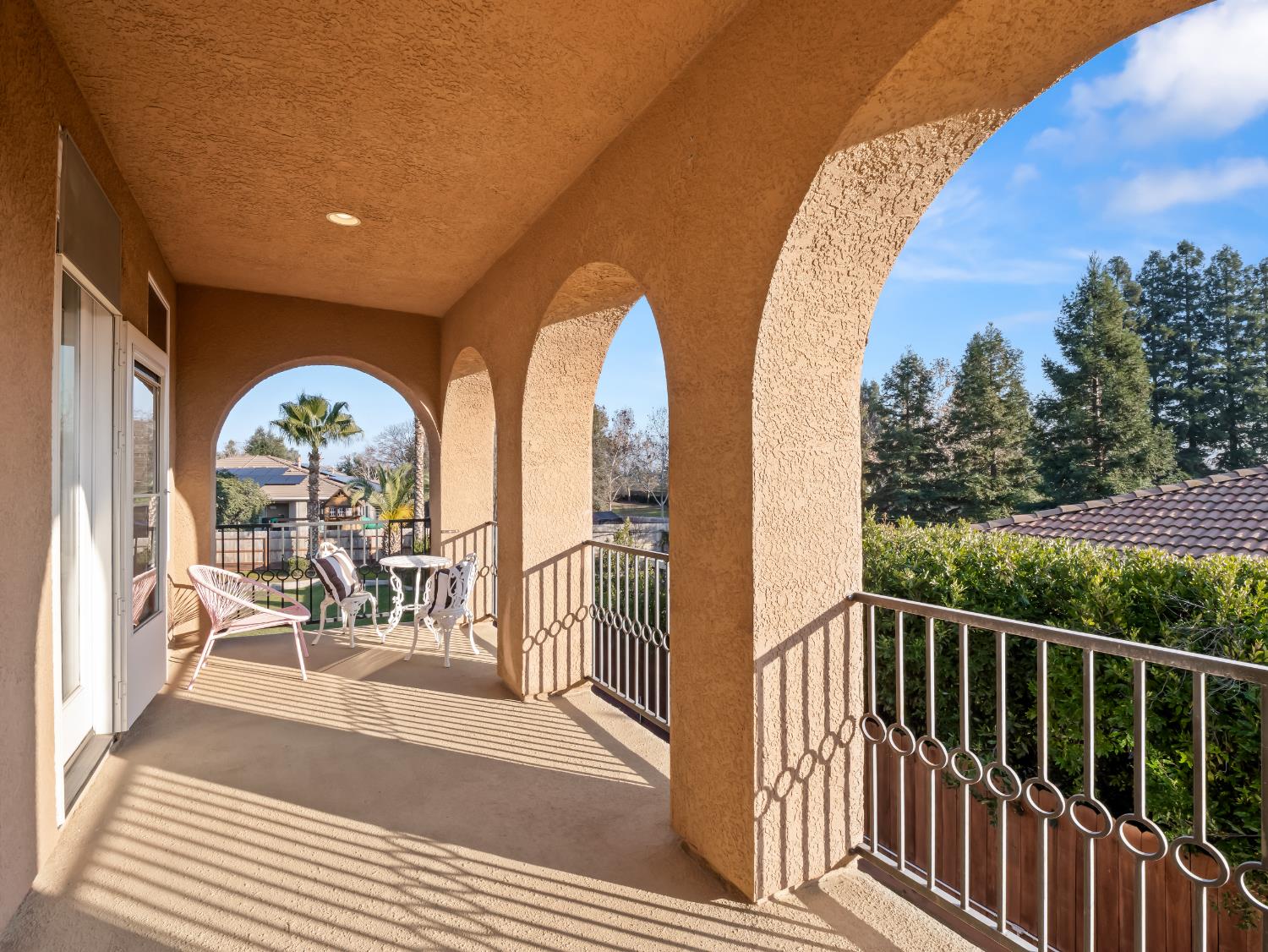 1152 Lester Avenue Clovis, CA 93619 - Photo 14 of 68 a view of a chairs and table in a balcony