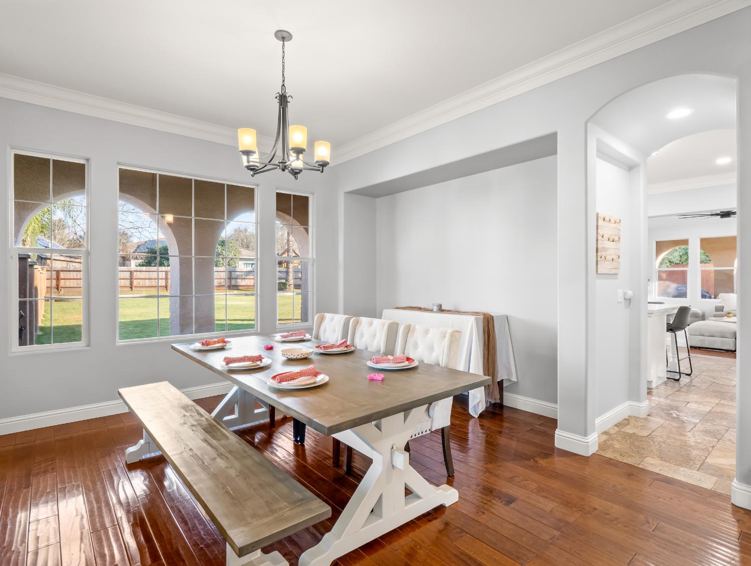 1152 Lester Avenue Clovis, CA 93619 - Photo 33 of 68 a view of a dining room with furniture window and wooden floor
