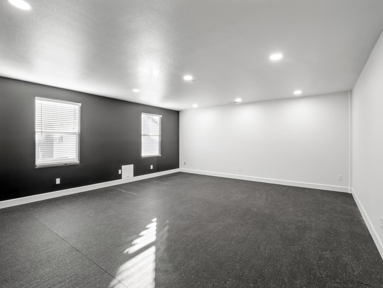 1152 Lester Avenue Clovis, CA 93619 - Photo 52 of 68 an empty room with windows and ceiling fan