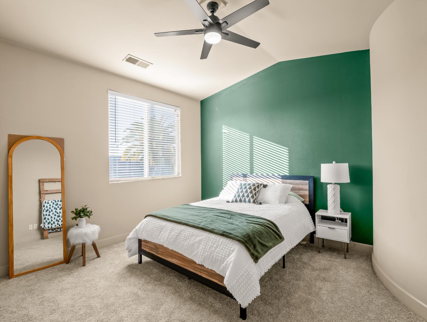 1152 Lester Avenue Clovis, CA 93619 - Photo 65 of 68 a bedroom with a bed and a chandelier