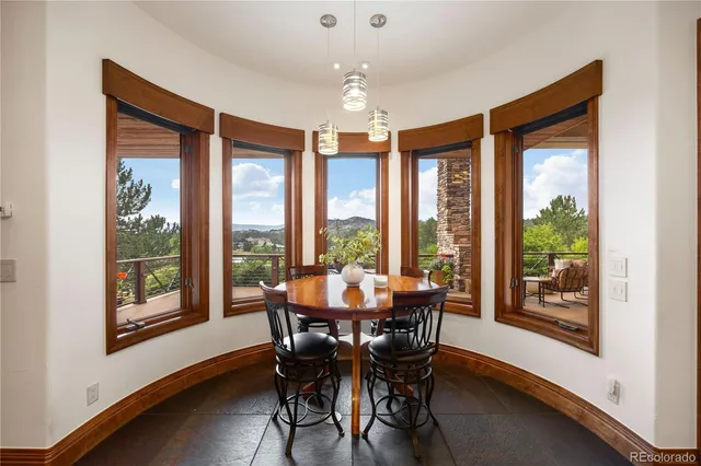 a large bathroom with a large tub and sink