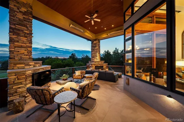 a living room with furniture a fireplace and a fireplace