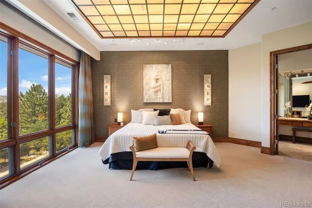 a kitchen with stainless steel appliances granite countertop a stove and a refrigerator