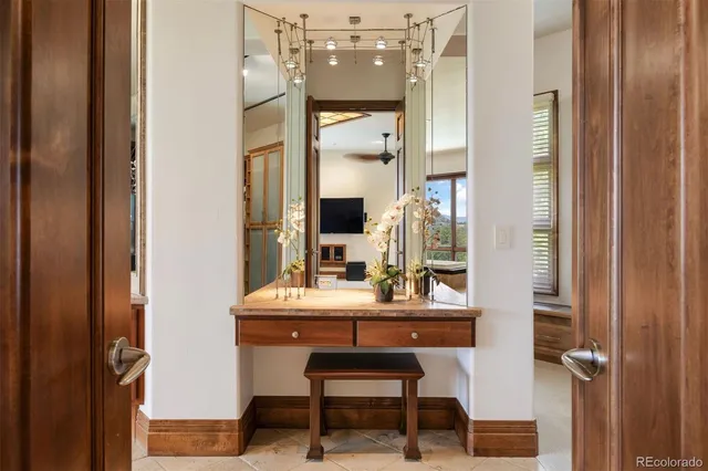 a living room with furniture a window and a fireplace