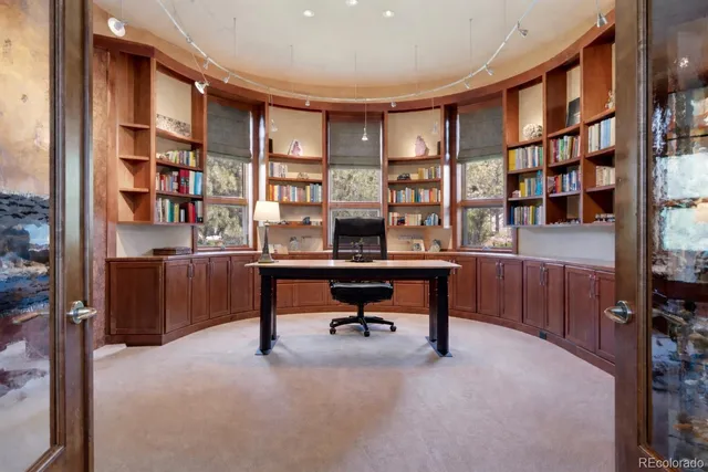 a bathroom with a sink toilet and a mirror