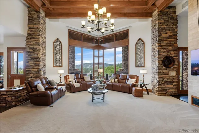 a kitchen with kitchen island a sink appliances and cabinets