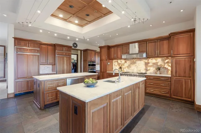 a spacious bedroom with a bed and a large window