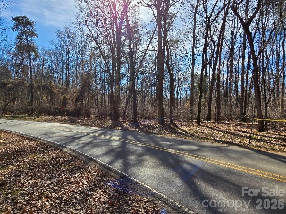 10824 Wildlife Road Charlotte, NC 28278 - Photo 4 of 6 a view of a house with trees in the background