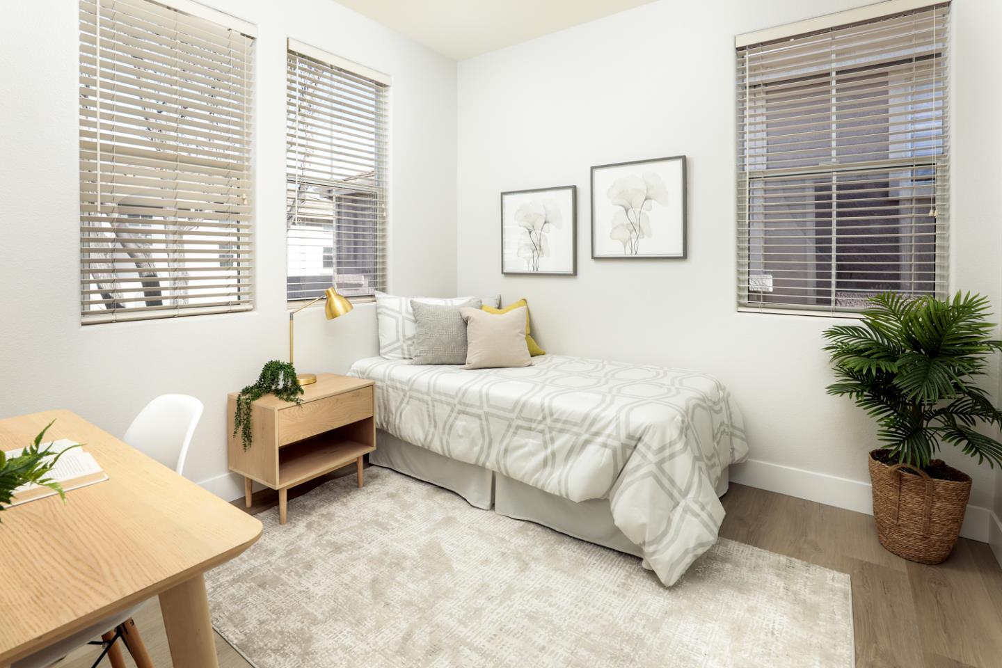 425 Nicholas Drive Mountain View, CA 94043 - Photo 17 of 36 a bedroom with bed and a potted plant