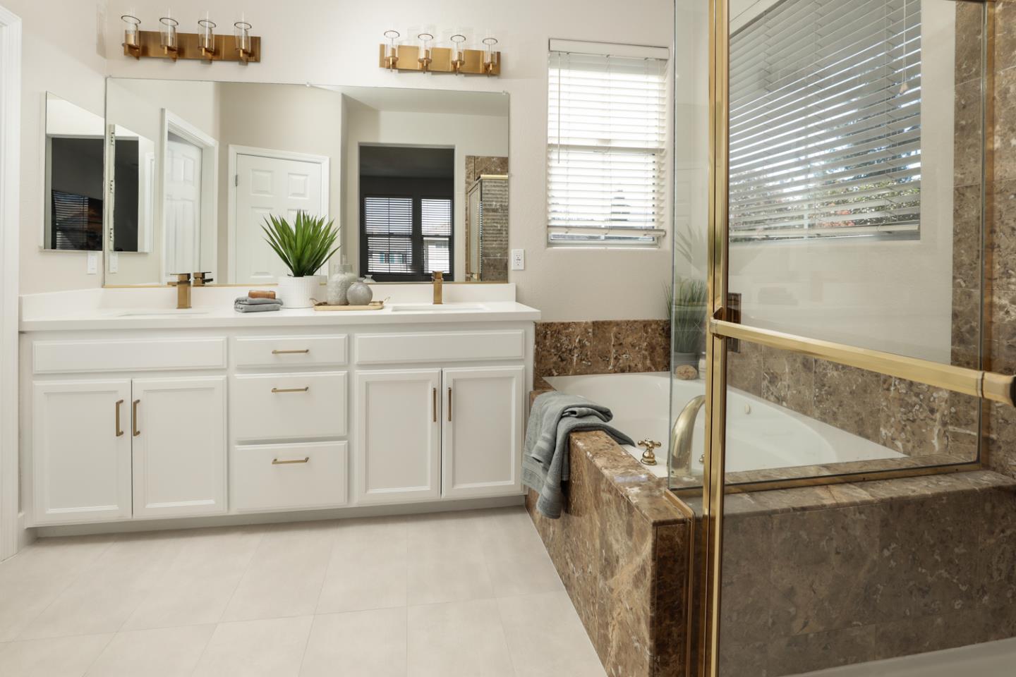 425 Nicholas Drive Mountain View, CA 94043 - Photo 23 of 36 a spacious bathroom with a granite countertop sink a mirror and a bathtub