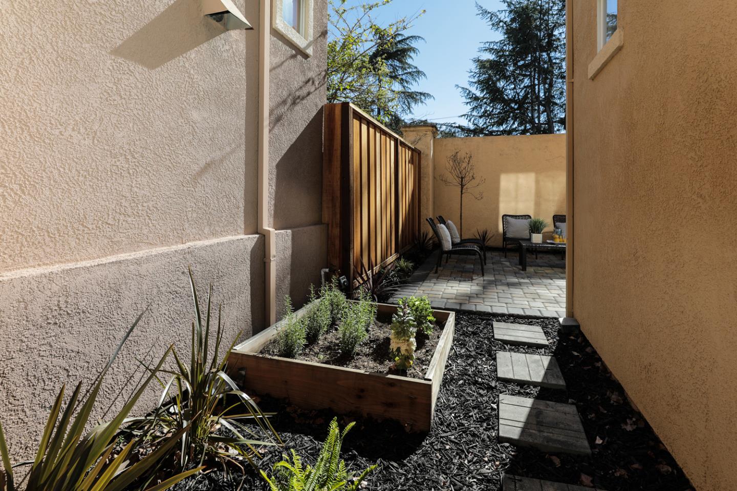 425 Nicholas Drive Mountain View, CA 94043 - Photo 30 of 36 a backyard of a house with lots of green space