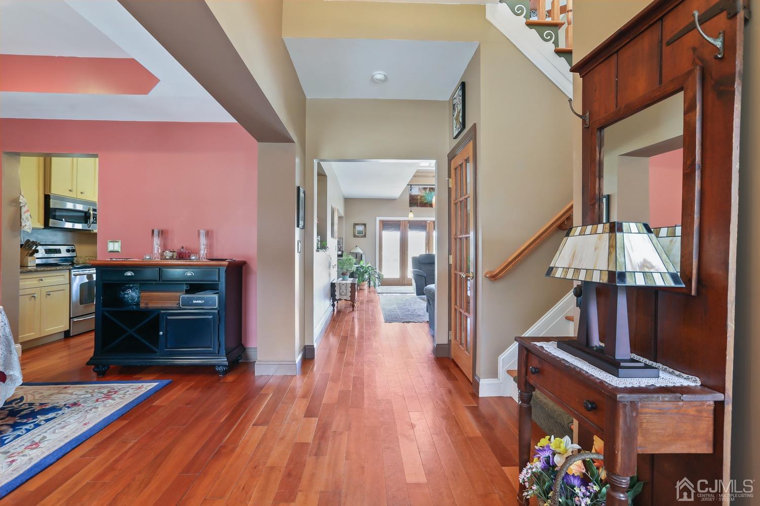 39 Loveman Road Cream Ridge, NJ 08514 - Photo 14 of 73 a view of entryway and kitchen with wooden floor