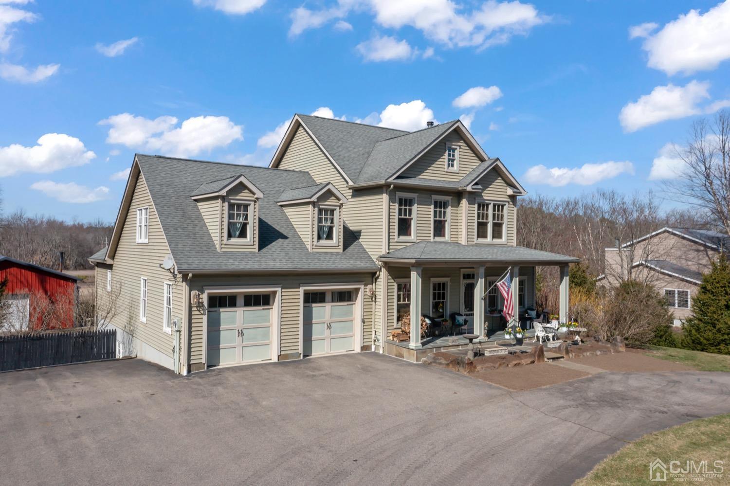 39 Loveman Road Cream Ridge, NJ 08514 - Photo 3 of 73 a view of a house with a patio and a yard