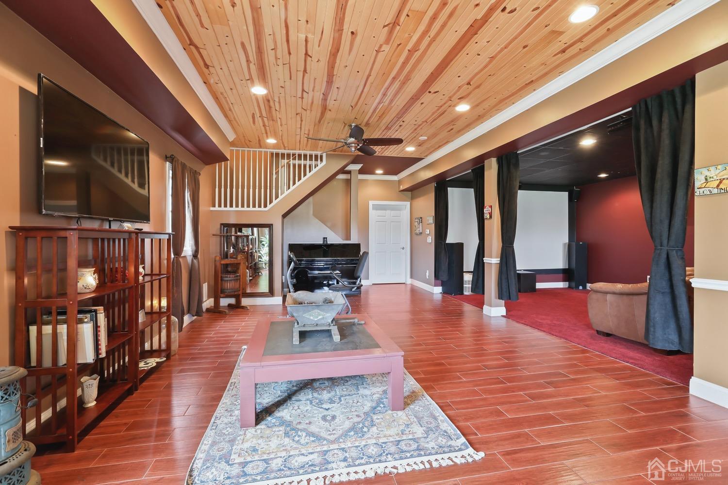 39 Loveman Road Cream Ridge, NJ 08514 - Photo 46 of 73 a living room with furniture and a wooden floor