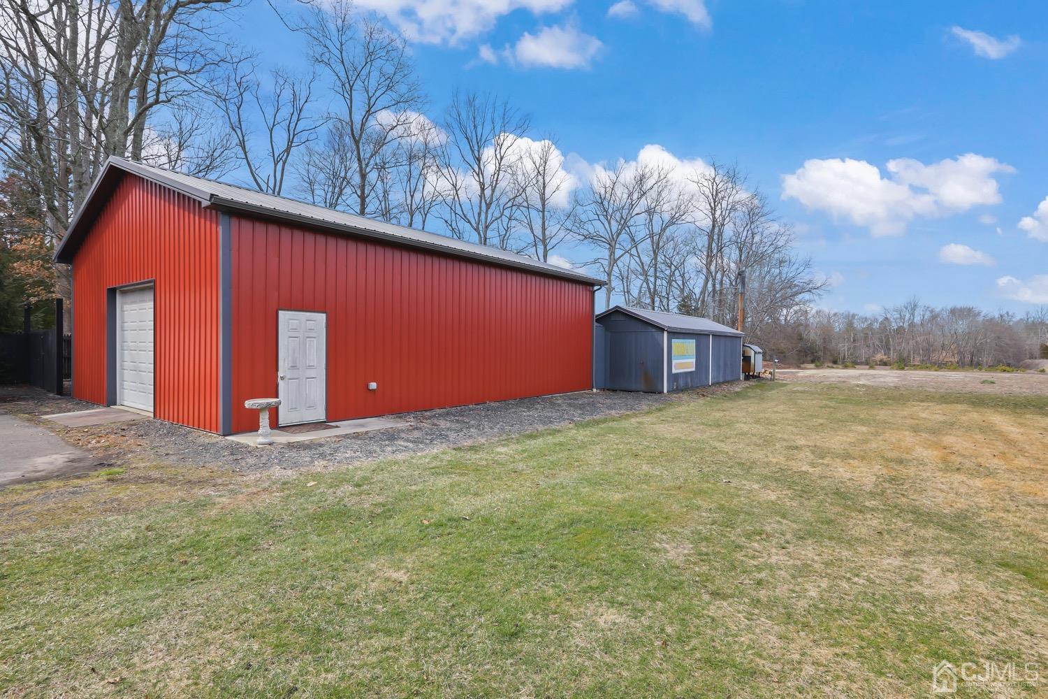 39 Loveman Road Cream Ridge, NJ 08514 - Photo 55 of 73 a backyard of a house with lots of green space
