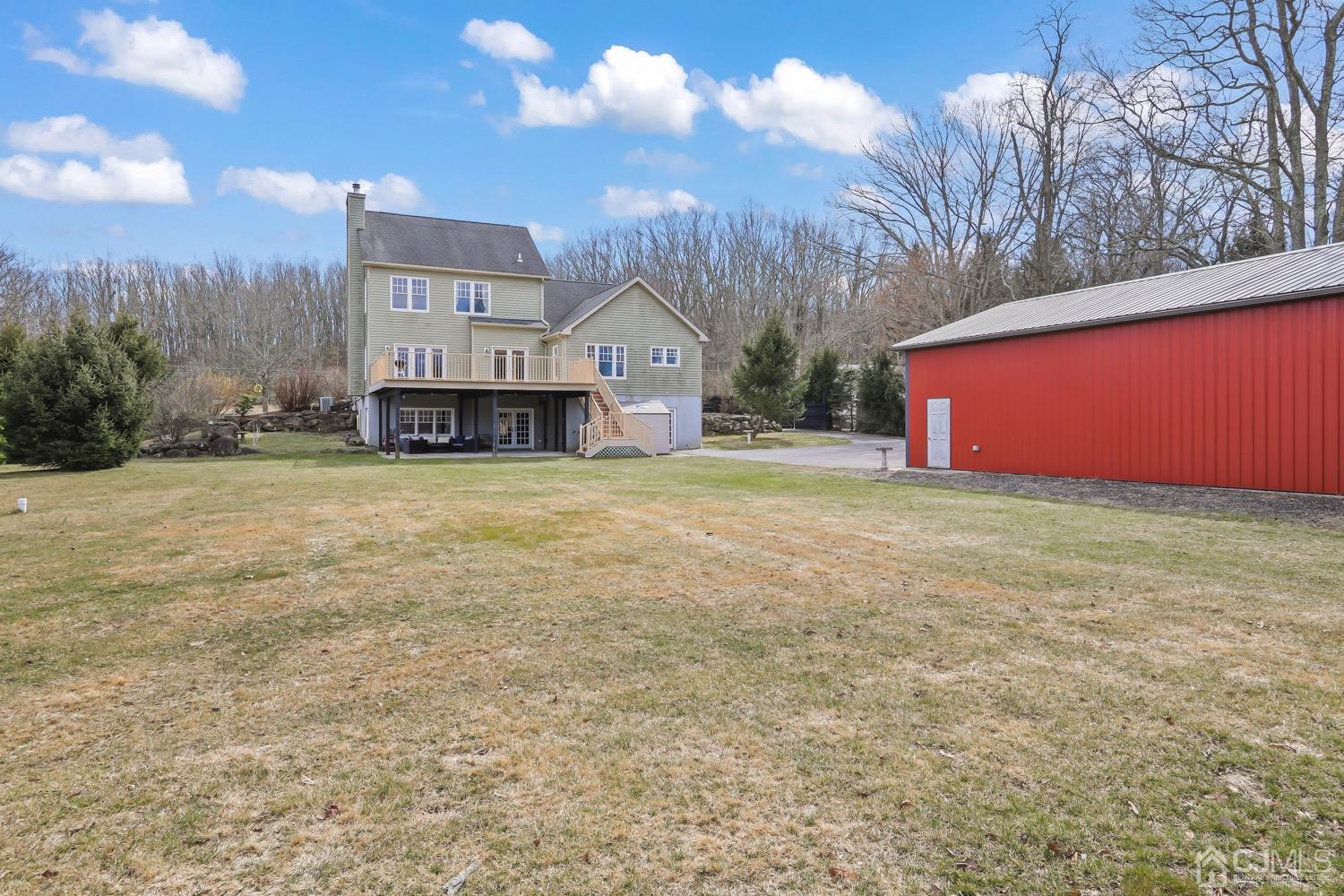 39 Loveman Road Cream Ridge, NJ 08514 - Photo 56 of 73 a view of a house with a yard and sitting area