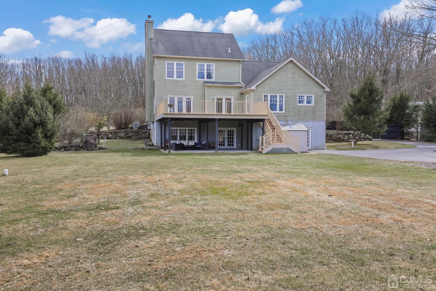 39 Loveman Road Cream Ridge, NJ 08514 - Photo 57 of 73 a view of a house with a yard and sitting area