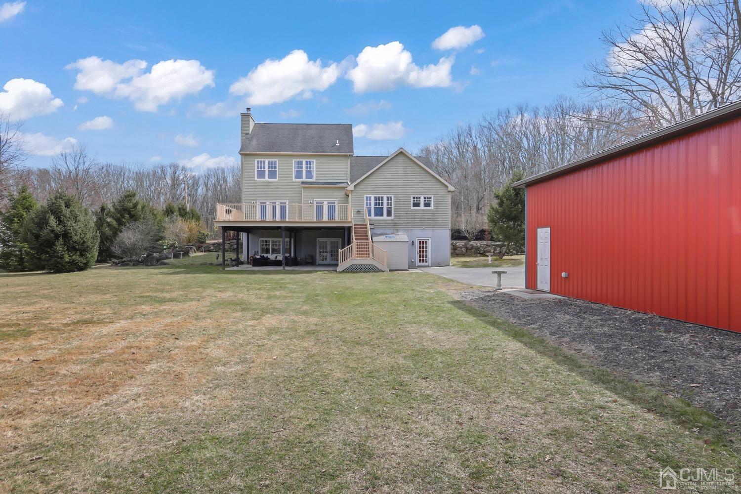 39 Loveman Road Cream Ridge, NJ 08514 - Photo 58 of 73 a view of a house with a yard and large tree