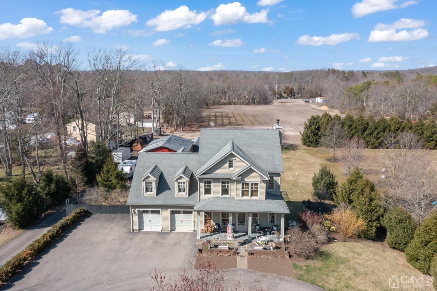 39 Loveman Road Cream Ridge, NJ 08514 - Photo 67 of 73 an aerial view of a house with a big yard