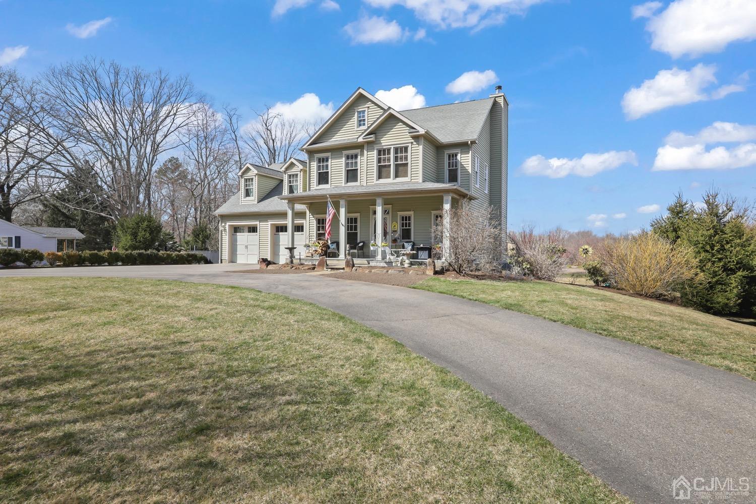 39 Loveman Road Cream Ridge, NJ 08514 - Photo 7 of 73 a front view of a house with a yard