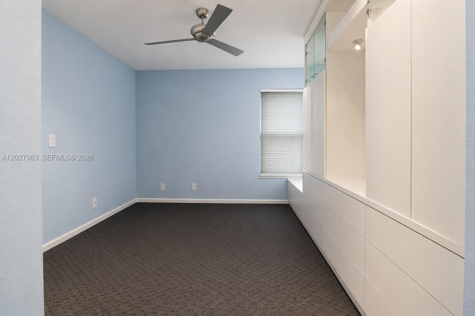 6646 Northwest 25th Terrace Boca Raton, FL 33496 - Photo 22 of 48 a view of an empty room with a window