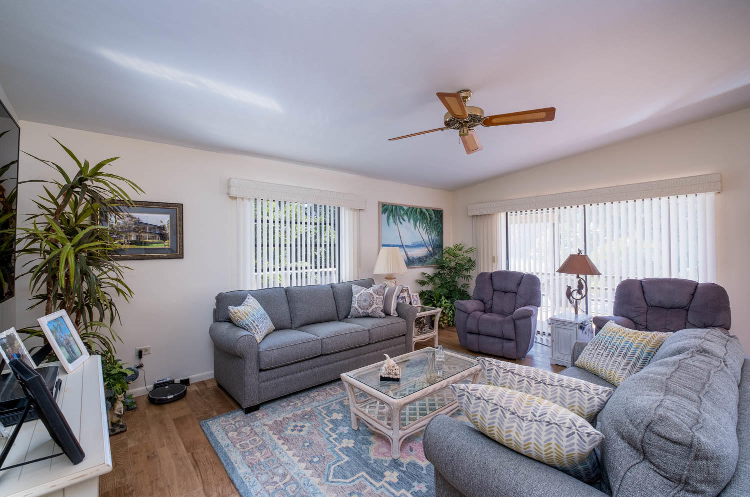 205 Sunset Boulevard Key Largo, FL 33037 - Photo 14 of 42 a living room with furniture a ceiling fan and a window