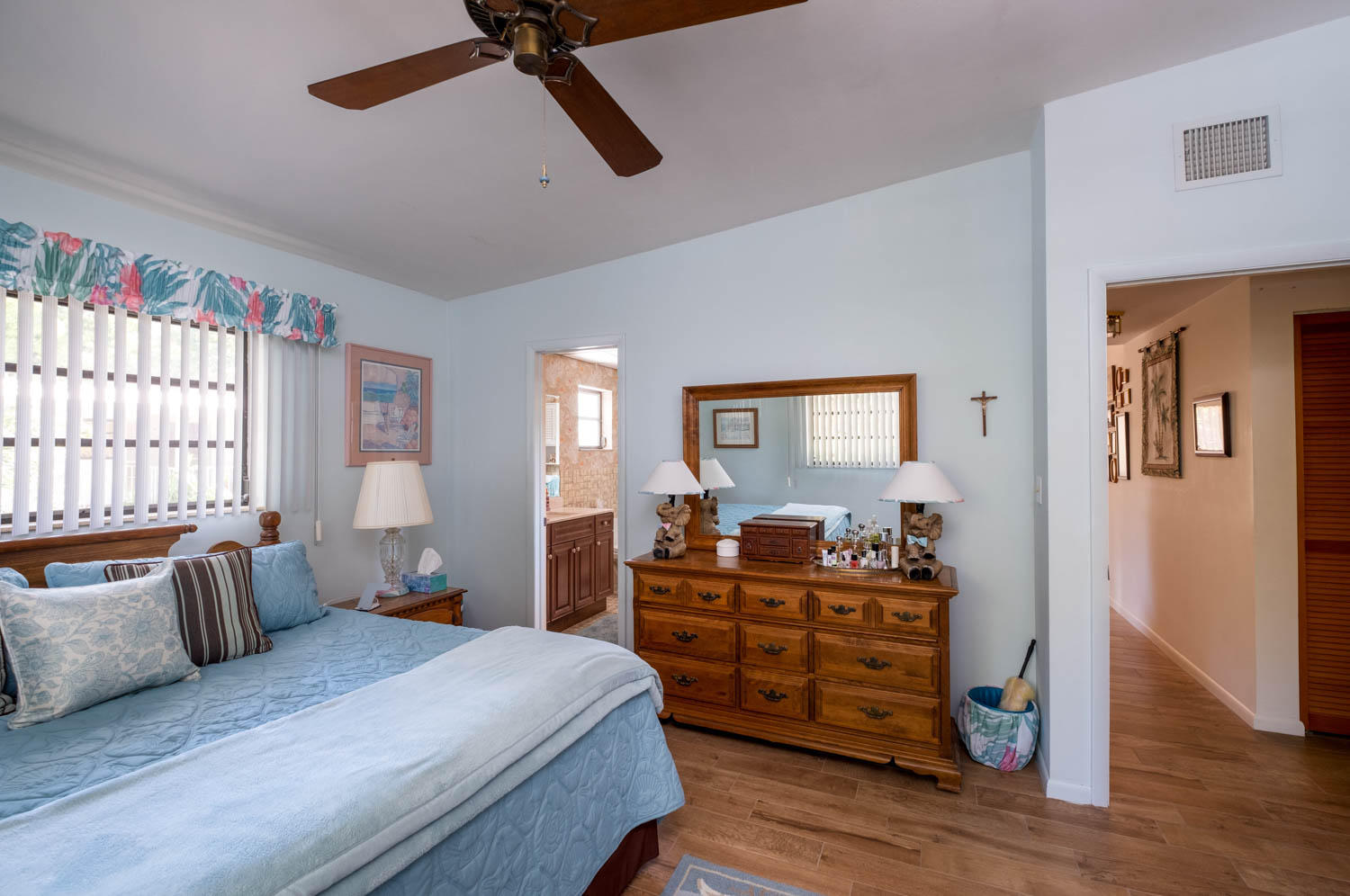 205 Sunset Boulevard Key Largo, FL 33037 - Photo 17 of 42 a bedroom with furniture and wooden floor