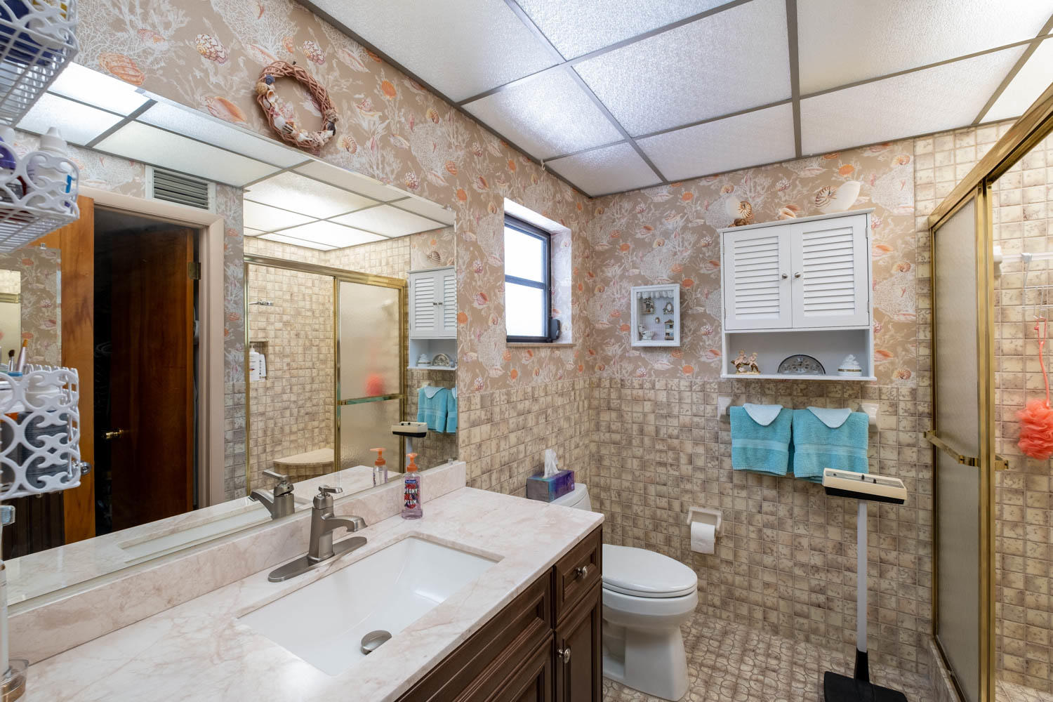 205 Sunset Boulevard Key Largo, FL 33037 - Photo 18 of 42 a bathroom with a sink toilet and shower