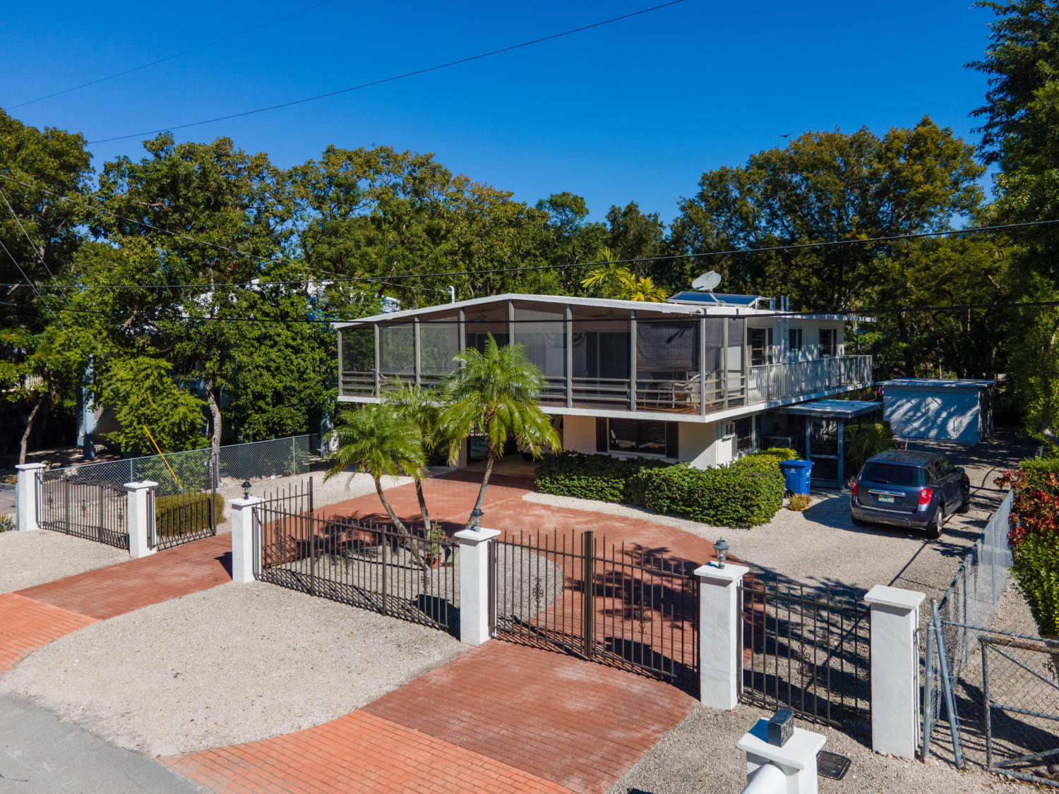 205 Sunset Boulevard Key Largo, FL 33037 - Photo 3 of 42 a view of a chairs and table in the patio