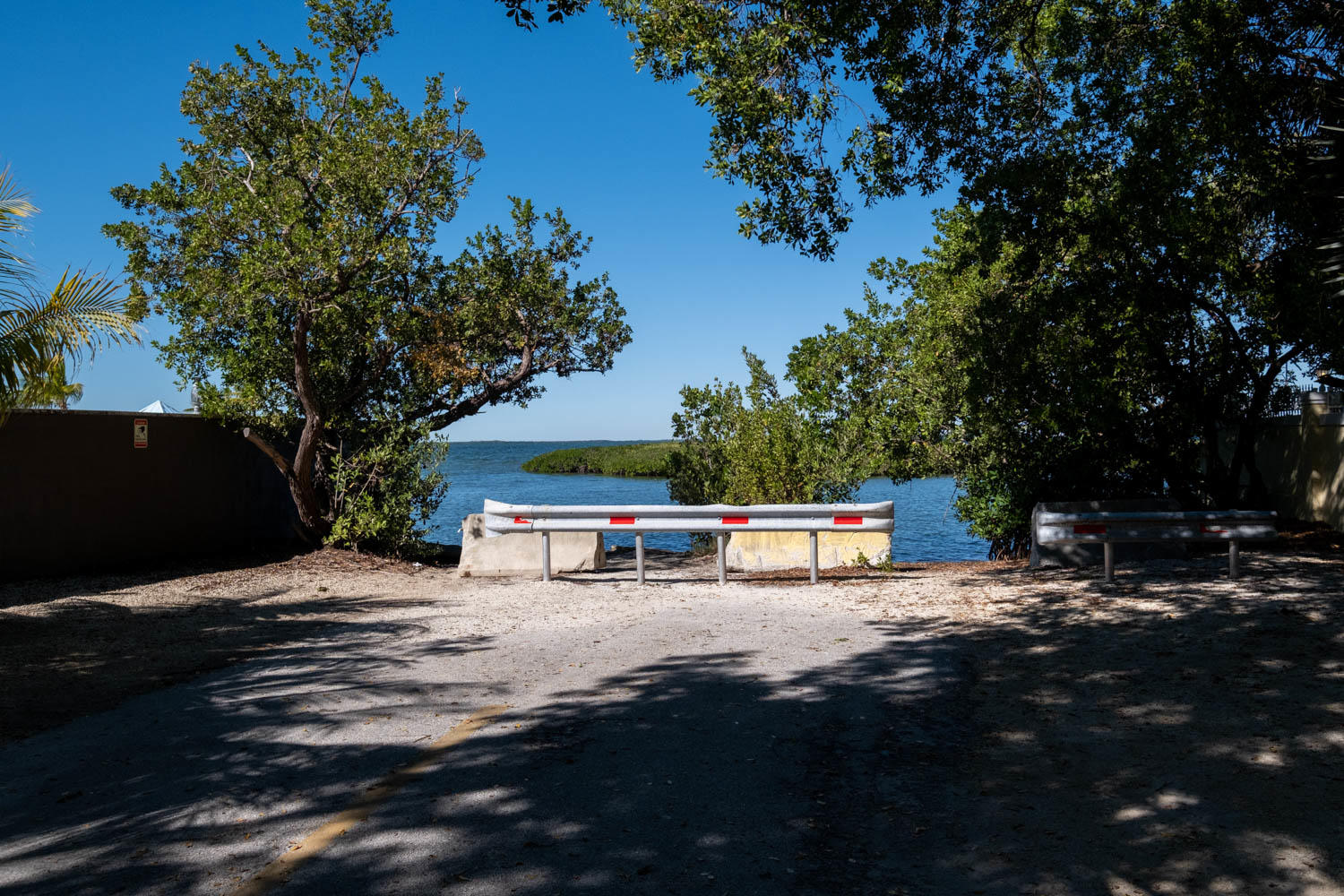 205 Sunset Boulevard Key Largo, FL 33037 - Photo 22 of 42 a view of a bench with tree in the background