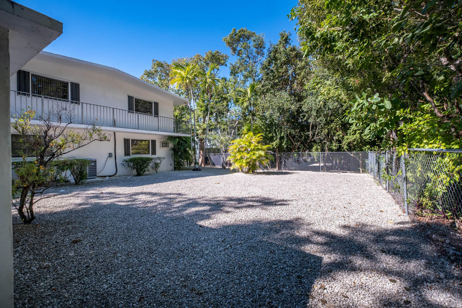 205 Sunset Boulevard Key Largo, FL 33037 - Photo 26 of 42 a view of a yard with plants and trees