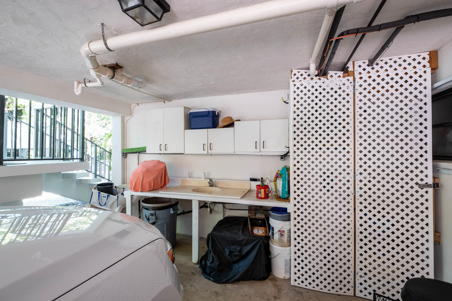 205 Sunset Boulevard Key Largo, FL 33037 - Photo 31 of 42 a bed room with a bed and a chair